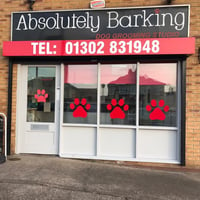 Absolutely Barking Dog Grooming Studio logo