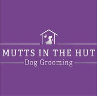 Mutts In The Hut Dog Grooming logo
