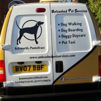 Unleashed Pet Services - dog walking, dog boarding, doggy daycare logo