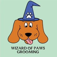 Wizard of Paws Grooming logo